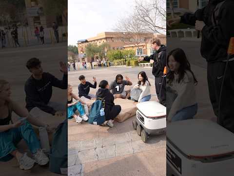 Random College Students put their hands on a Box for a Prize