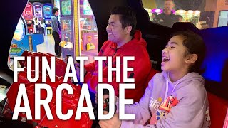The kids having fun at the arcade