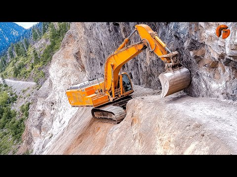 Skillful Excavator Operators are Building Roads on a Steep Mountain ▶3