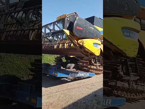 Giant combine harvester climbed onto transport vehicle #shorts #farm