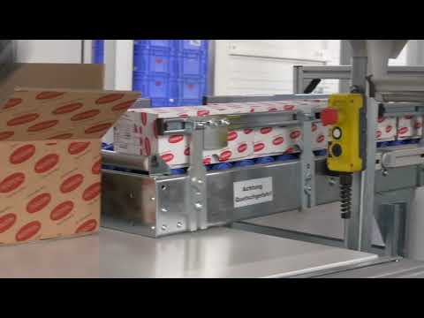 Verpackungsanlage mit AutoStore-Anbindung und Etikettierer