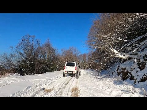 SUZUKI JIMNY traveling in the snow