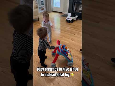 Clever baby goes in for a hug in order to take back his toy, unexpected plot twist using sneak skill