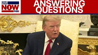 Pres  Trump answers reporter questions in the Oval Office
