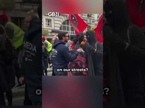 Masked up ant-fascist protesters THREATENED ME