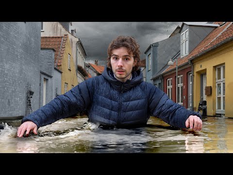 Besøger by der kan ende under vand