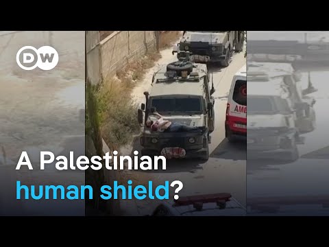 Israeli troops strap man to hood of jeep during West Bank raid | DW News