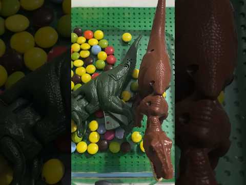 “Toy Dinosaurs Take a Candy Bath! 🍬🦖 #Shorts”