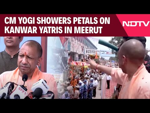 UP Kanwar Yatra | UP CM Yogi Adityanath Showers Flowers Petals On Kanwar Yatris In Meerut