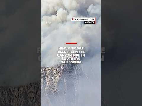 Heavy smoke rises from the Canyon Fire in southern California