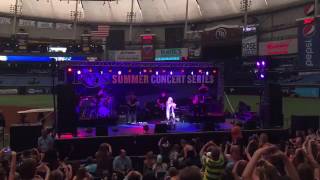 Sabrina carpenter on stage performing " Thumbs" live at Rays Baseball game in Tampa