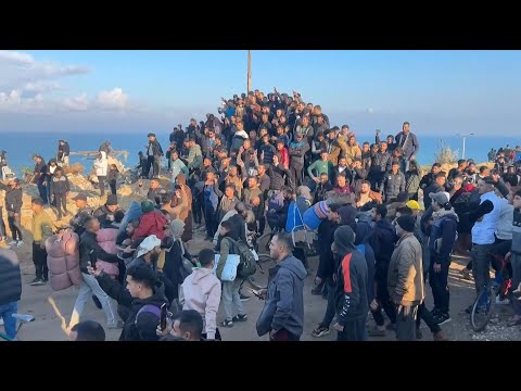 Displaced Palestinians arrive to northern Gaza after the reopening of the road | AFP