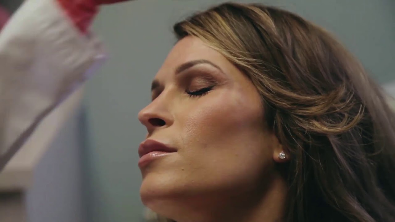 Woman receiving a beauty treatment or procedure.