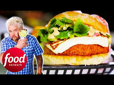 Guy Tries A Cheese & Seafood Burger At Eclectic International Restaurant | Diners Drive-Ins & Dives