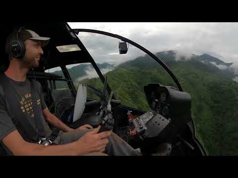 Helicopter Deliverying Bibles and Supplies to Mountain School in a Robinson R66
