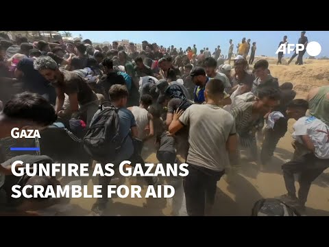 Gunfire amid chaotic scenes as Gazans scramble for desperately-needed aid in Al-Zawayda | AFP