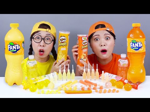 黄色的 VS 橙色食品挑战多纳 DONA