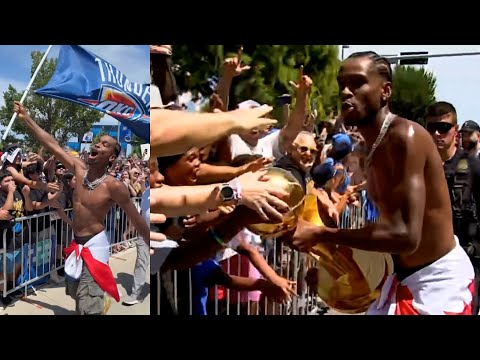 SGA goes shirtless at Championship parade and lets OKC fans touch the trophy