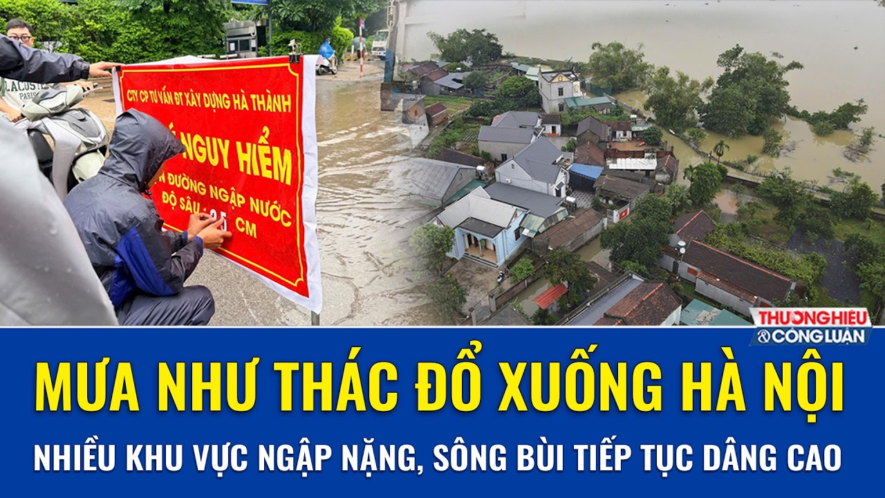 Mưa xối xả trút xuống Hà Nội, đường phố hóa sông, sông Bùi dâng vượt báo động III