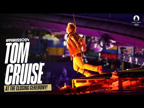 Tom Cruise abseils from the stadium roof, and rides off on a motorbike! | #Paris2024 - YouTube