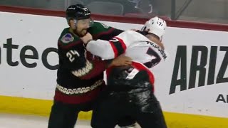 Brady Tkachuk scrumming with Matt Dumba AKA "Dumbo"