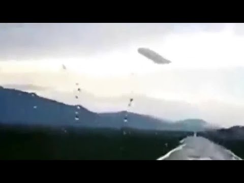 A Huge UFO was noticed by eyewitnesses on the way to the village of Ust-Koksa in Russia