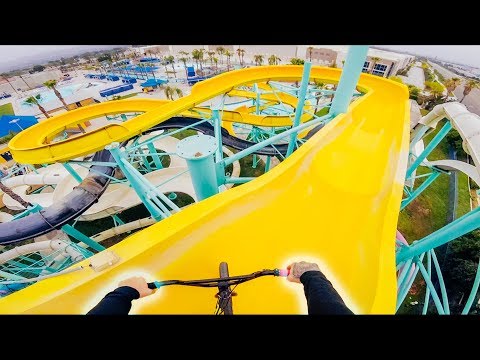 BMX VS WATERPARK! (DOWN THE BIG SLIDES)