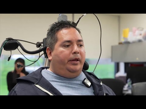 YouTube video thumbnail: New Technology Helps Paralyzed Patients Move