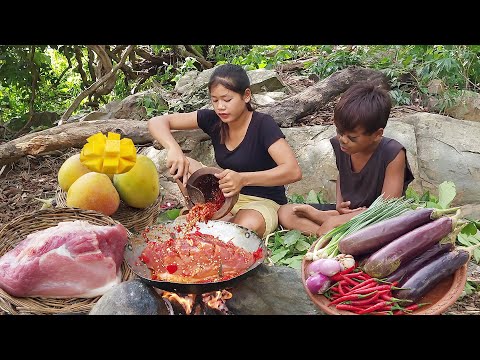 Ripe mango and Pork spicy braised with eggplant for food - Cooking and Eating delicious in jungle