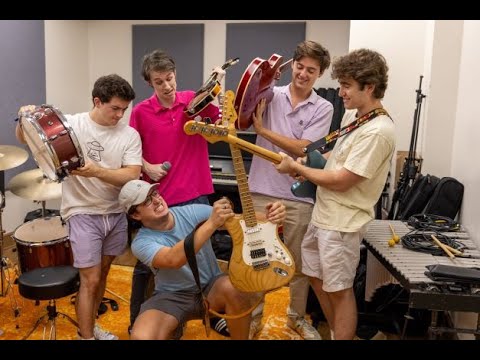 The Parsons Music Library is usually quiet on a Wednesday evening, filled with students getting work done for their Thursday classes or taking a solitary moment to practice their instruments. But in the music studio on the first floor of Parsons, the sound of music bounces off the walls as the boys of Dogpark, a band made up of five University of Richmond students, practice for their next show. Despite the small space they practice in, the band makes the room feel like a stadium show as they play “Hard to Handle” by The Black Crowes.