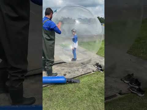 Zorbing {New} Getting in a zorbing ball