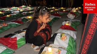 YouTube video thumbnail: Palestinians Gather In Gaza To Hold Funeral For Those Killed In Recent Airstrikes Around City
