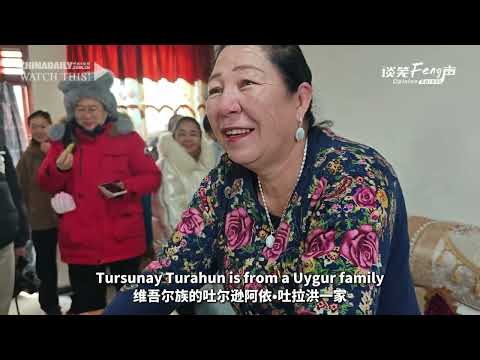 Xinjiang villagers celebrate Spring Festival in new homes