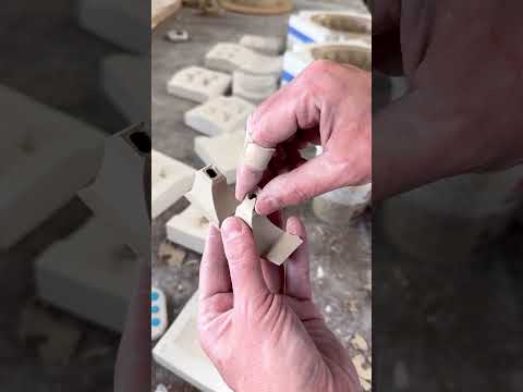 Casting my newest mold design. It will become a high fire porcelain planter.