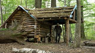 thunder and rain in bushcraft log cabin made by young hermit