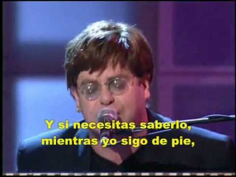 Im Still Standing En Espanol de Elton John Letra y Video