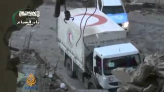 Aid convoy to Syria's Homs comes under attack