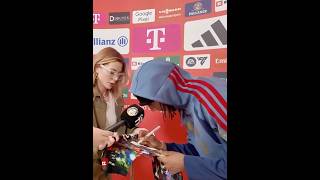 Michael Olise signing a shirt to send to Neymar after Bayern 7-0 Union Berlin | Bundesliga
