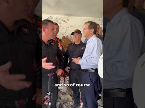 Israeli President Herzog visits site of missile attack in Central Israel