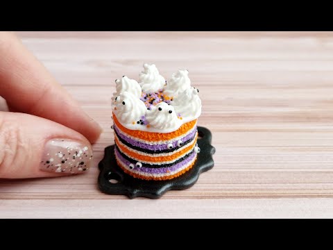 Miniature cake with eyes and ghosts for Halloween💜🖤🧡Polymer clay