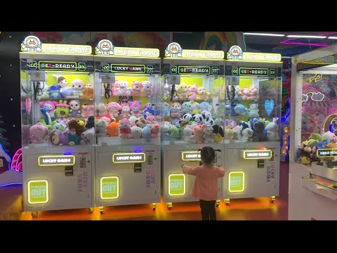 The baby is very excited about the games at indoor playground for kid