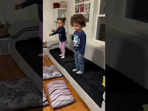 Dad jumps on imaginary trampoline