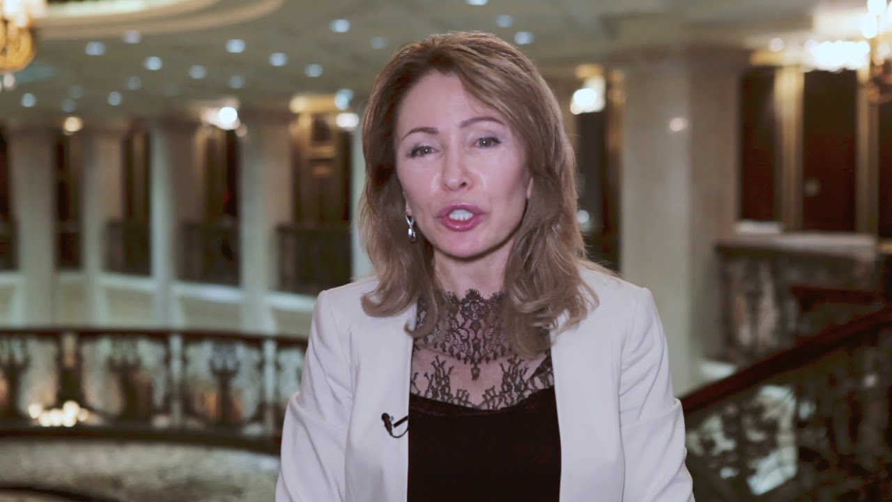 Businesswoman speaking in elegant interior setting