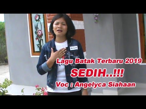 Lagu Batak Terbaru 2019 – Tega Doho – Angelyca Siahaan | (Official Musik Video){HD}