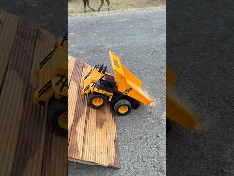 Three RC Construction Trucks Ramp Climb Battle ๐