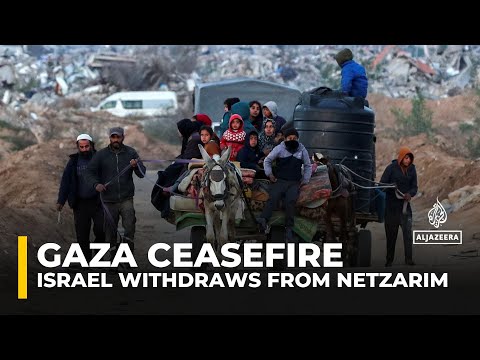 Palestinians make their way after Israeli withdrawal from Netzarim Corridor