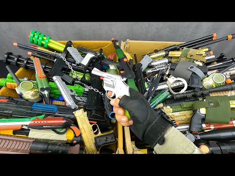 2 Giant Boxes of Toy Guns, Dangerous Toy Guns, Tec-9, AK47, Desert Eagle And Shotgun & Equipment