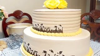 PASTEL DE GRADUACION (80 PORCIONES) 14"y10" tres leches, pan de vainilla, crema de moka
