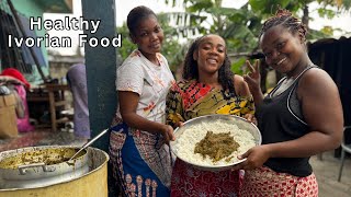 Cooking Traditional Ivorian food || PALM NUT SOUP with CASSAVA LEAVES and Rice | West Africa