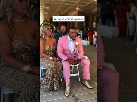 Parents trying not to cry at a wedding
